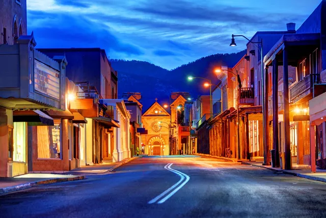 Historic downtown Santa Fe, New Mexico, with illuminated streets. Get noticed with the best Digital Marketing Company.